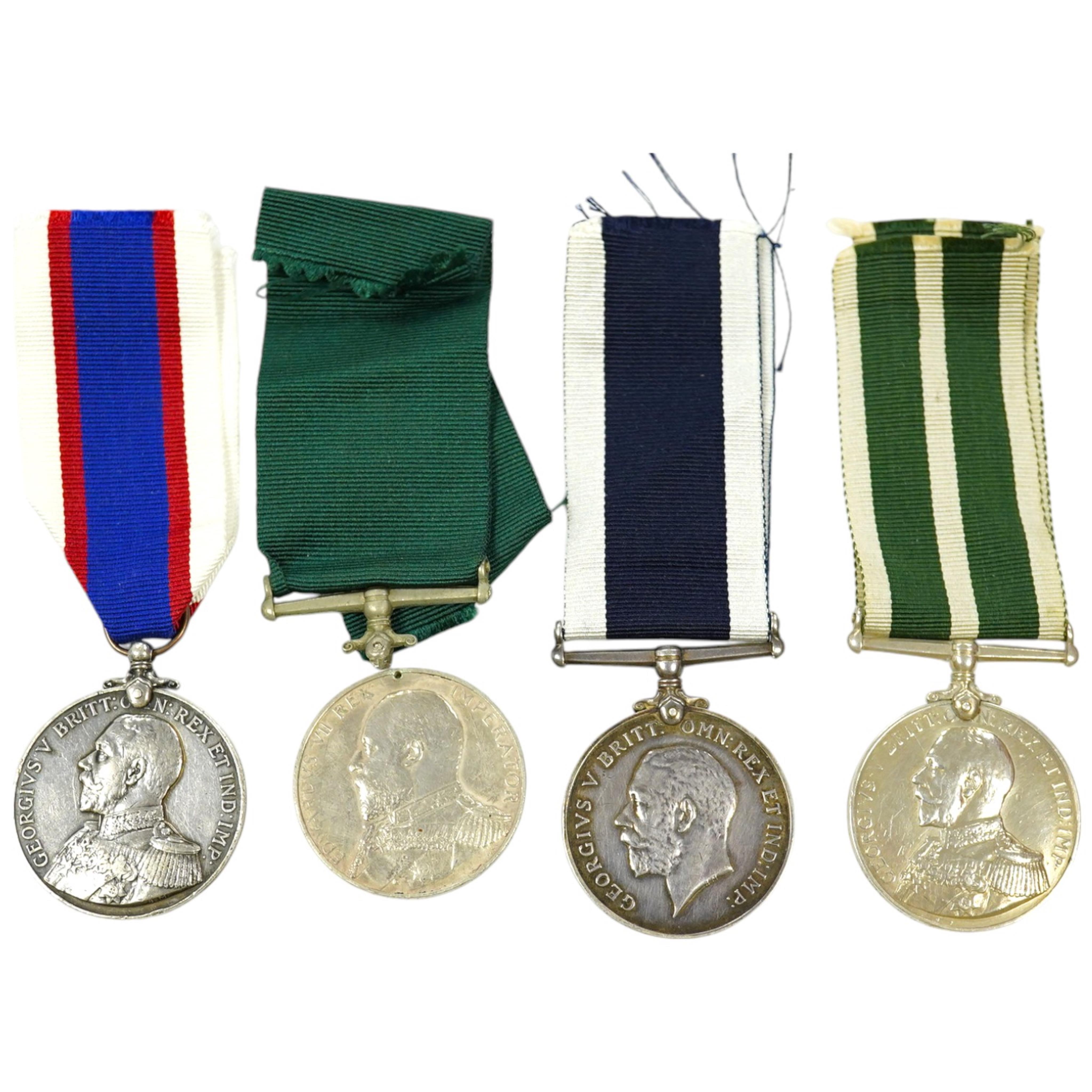 Four assorted Naval service medals; EVII Royal Naval Reserve LSGC to V.440. W.Lewis, STO.RNR.; GV Royal Fleet Reserve LSGC unnamed; GV RNLSGC (renamed) to J,87119 R.S. J.West. A.B.H.M.S.Victory; GV RNRLSGC to 1361V W.H.J